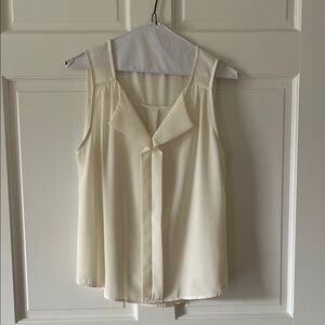 Chic Cream Sleeveless Blouse